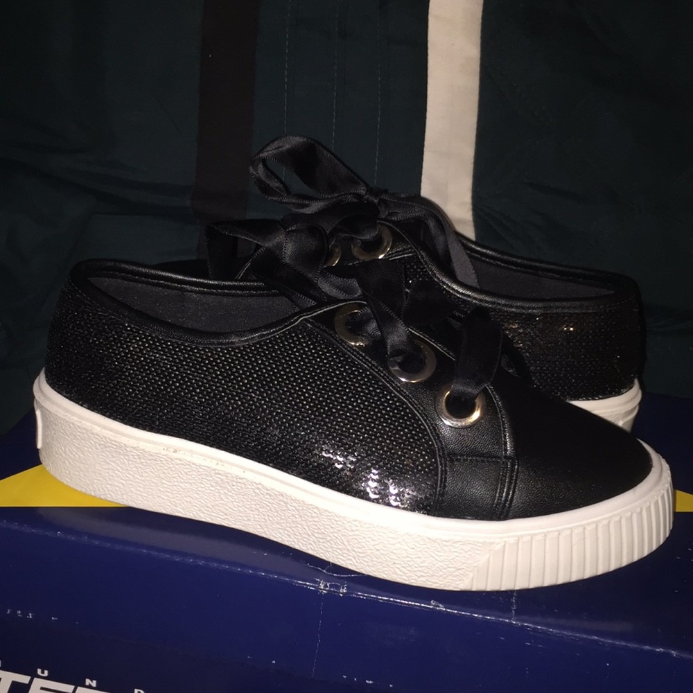 Black shoes. Available in any size you want.